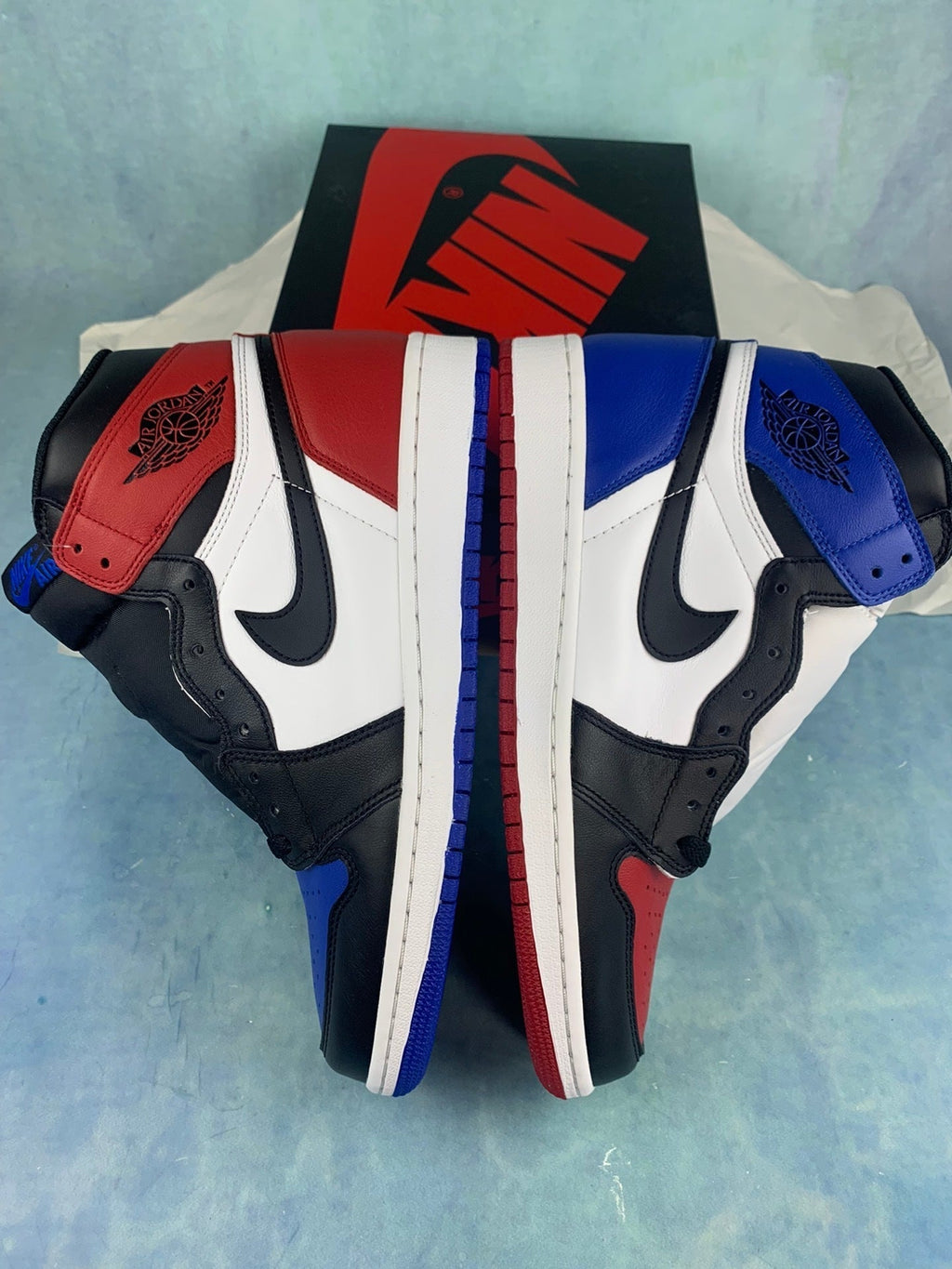 Air Jordan 1 High White, Blue, and Red Asymmetrical Pair Unisex Sneakers