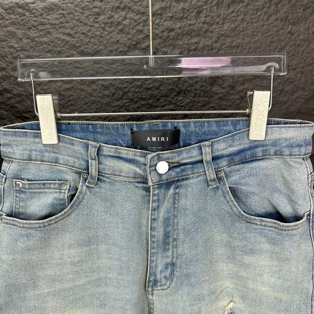 AMIRI Black Ribbed Patch Distressed Slim‑Fit Denim Jeans
