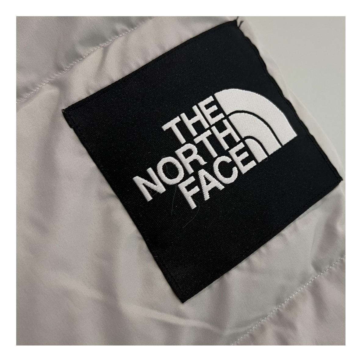 The North Face Color-Block Hooded Long Puffer Coat in Grey